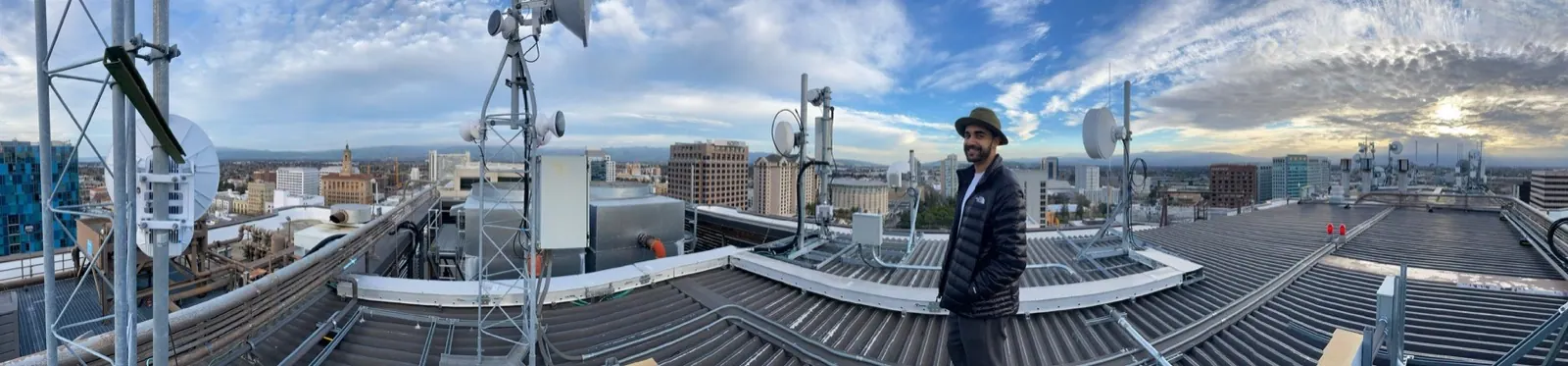 Rooftop infrastructure survey above the city.