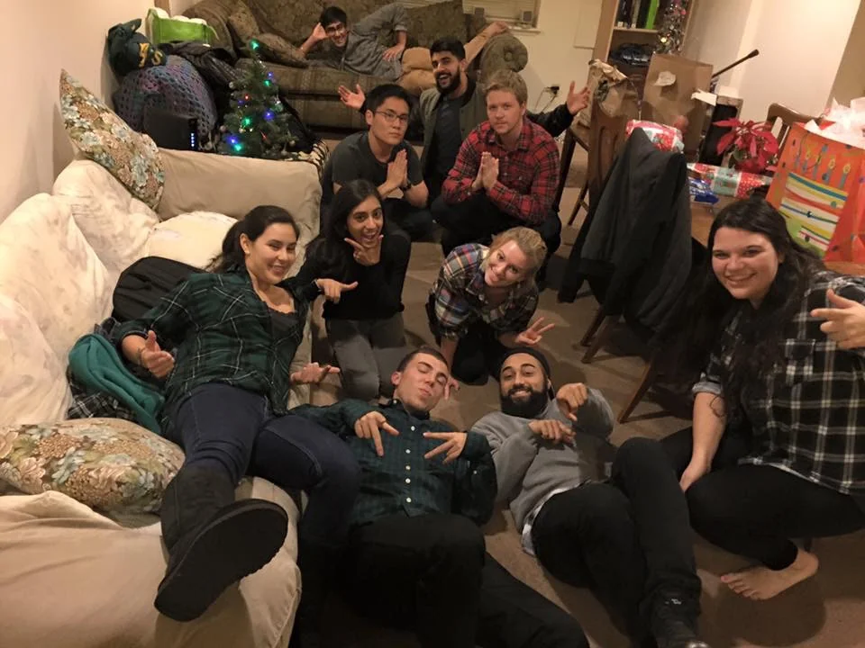 A group gathered in a living room.